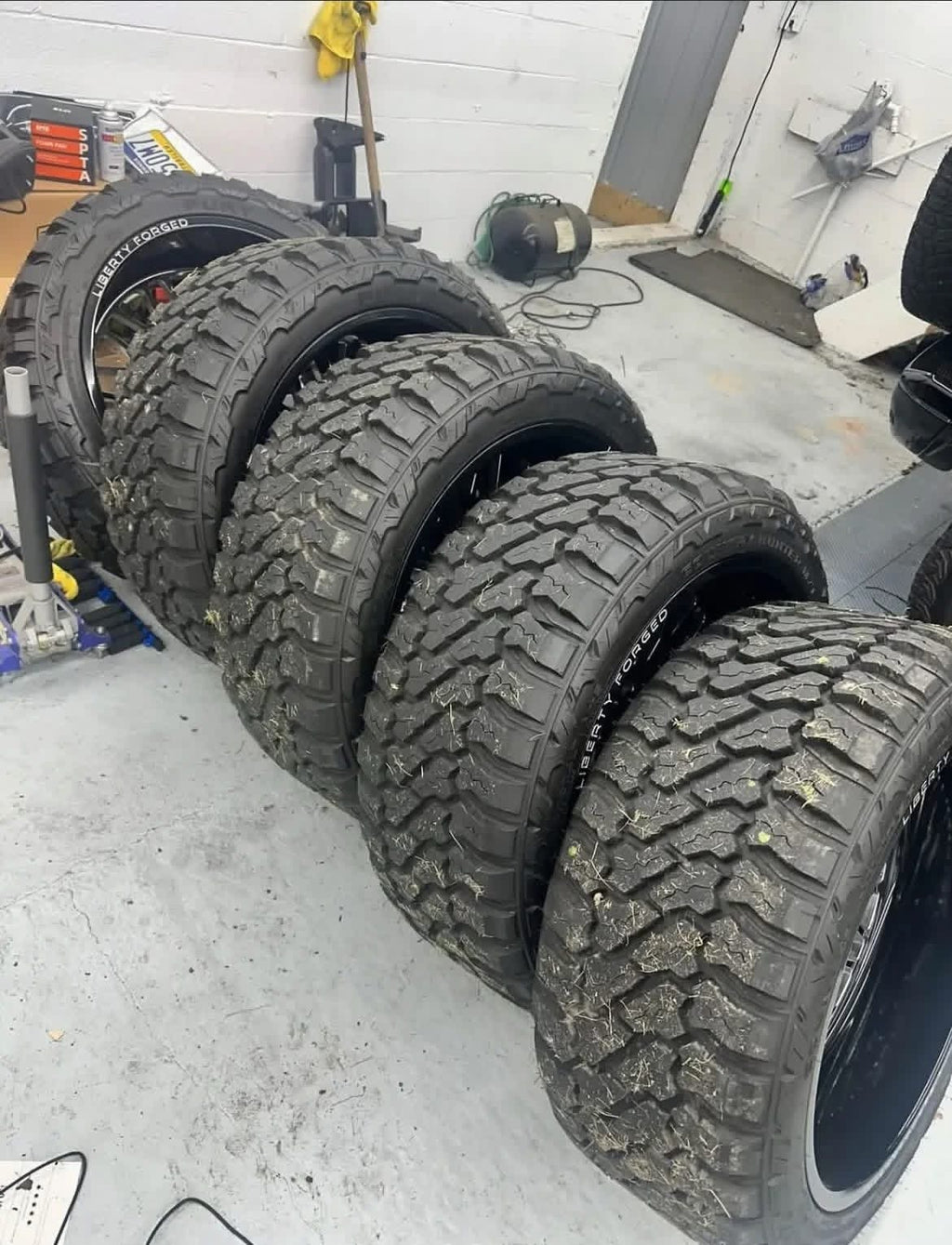 24x12 Liberty Forged Wheels wrapped in 35” Fury Tires