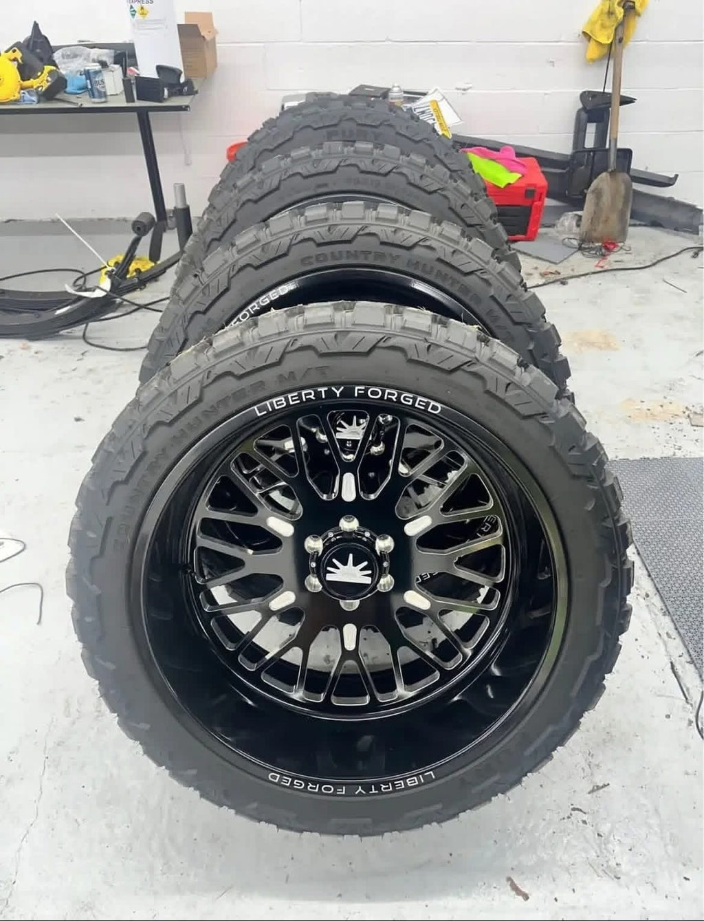 24x12 Liberty Forged Wheels wrapped in 35” Fury Tires