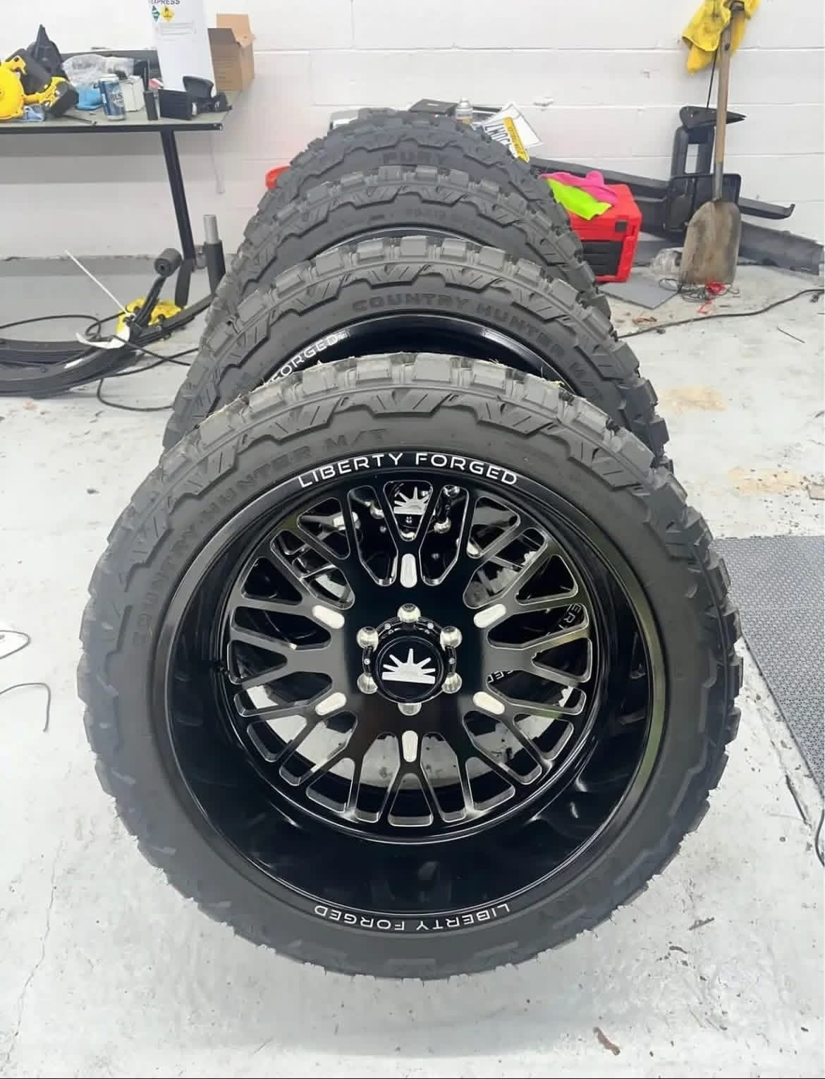 24x12 Liberty Forged Wheels wrapped in 35” Fury Tires